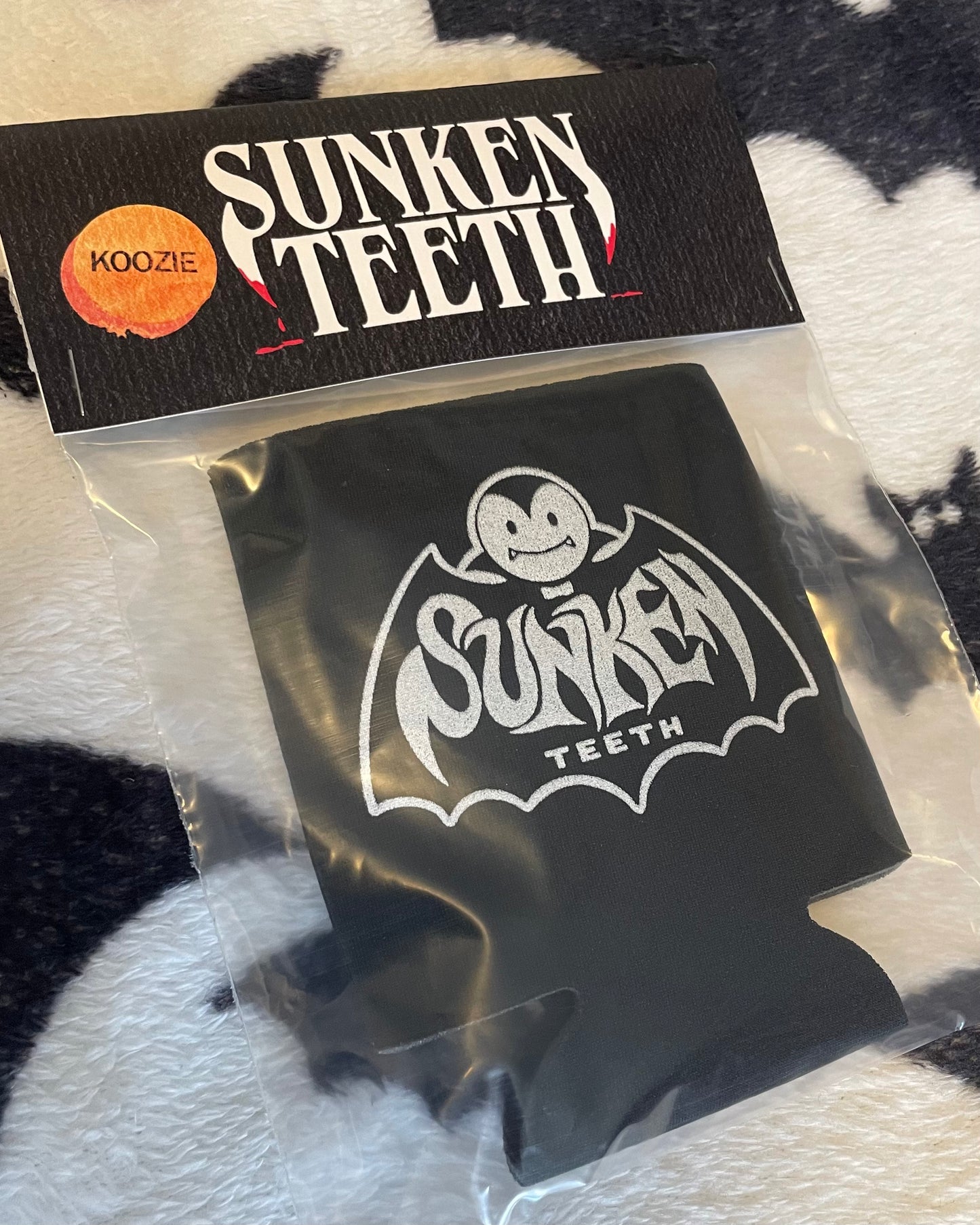 Sunken Teeth Koozie